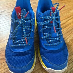 Kids Blue and Yellow Under Armour Curry sneakers 6Y